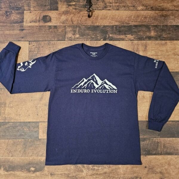 A long sleeve t-shirt with the words " mountain expeditions ".