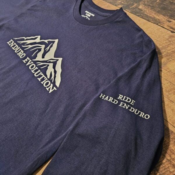 A long sleeve t-shirt with the words " ride hard in duro ".