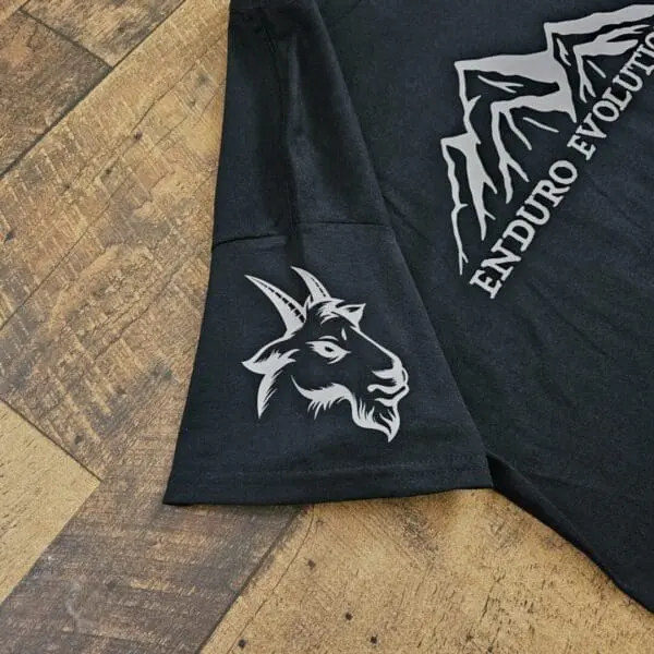 A black t-shirt with an animal on it.