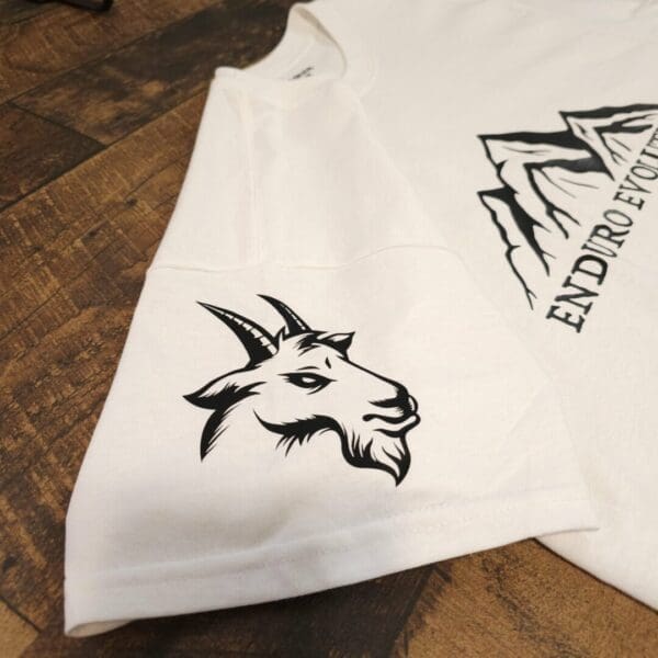 A white t-shirt with an animal head on it.