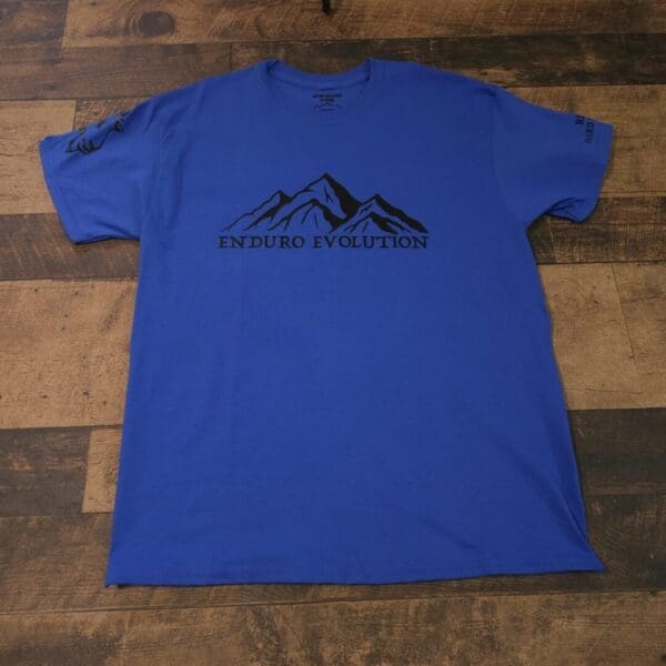 A blue t-shirt with the words " rocky mountain ".