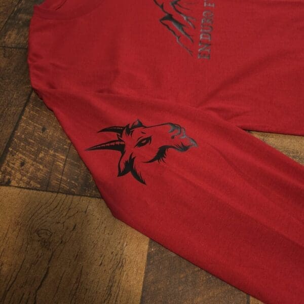A red pair of pants with black writing on them.