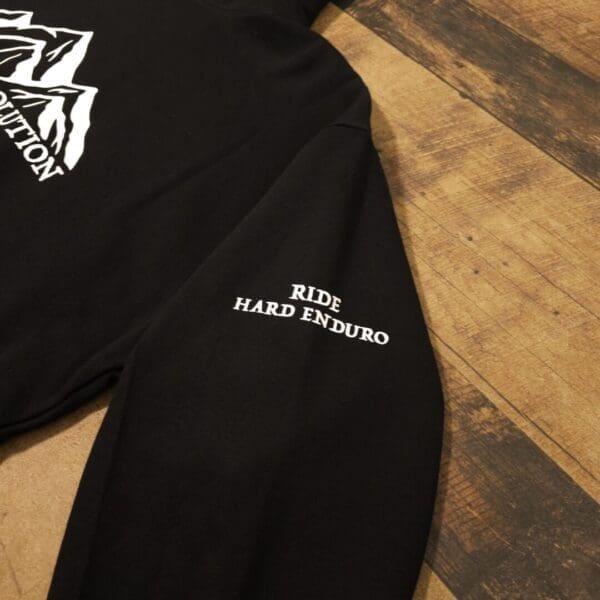 A black sweatshirt with the words king hard enduro on it.
